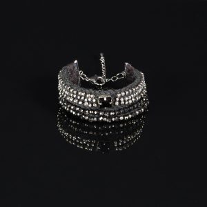 Handmade black and silver beaded bracelet with multi-strand design on textile base, featuring glass beads and rhinestone detail.