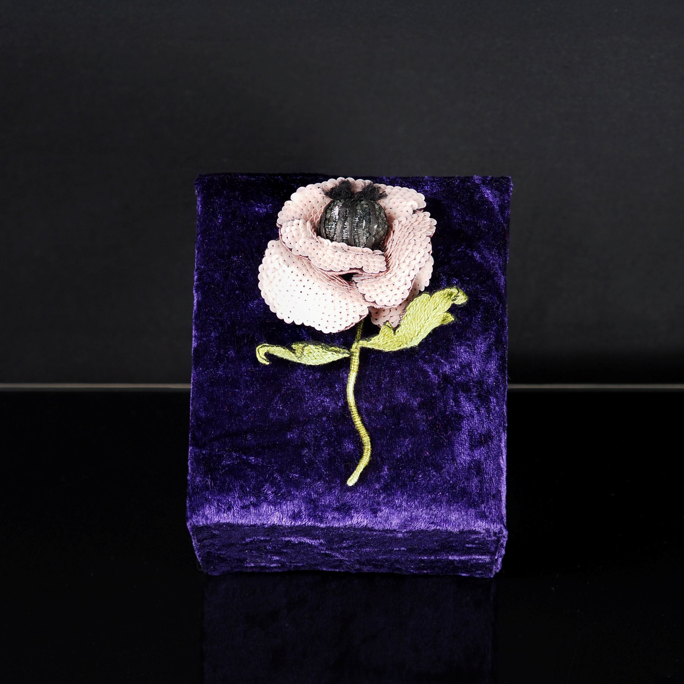 Blush_Pink_Poppy_Brooch_Displayed_on_Velvet_Stand