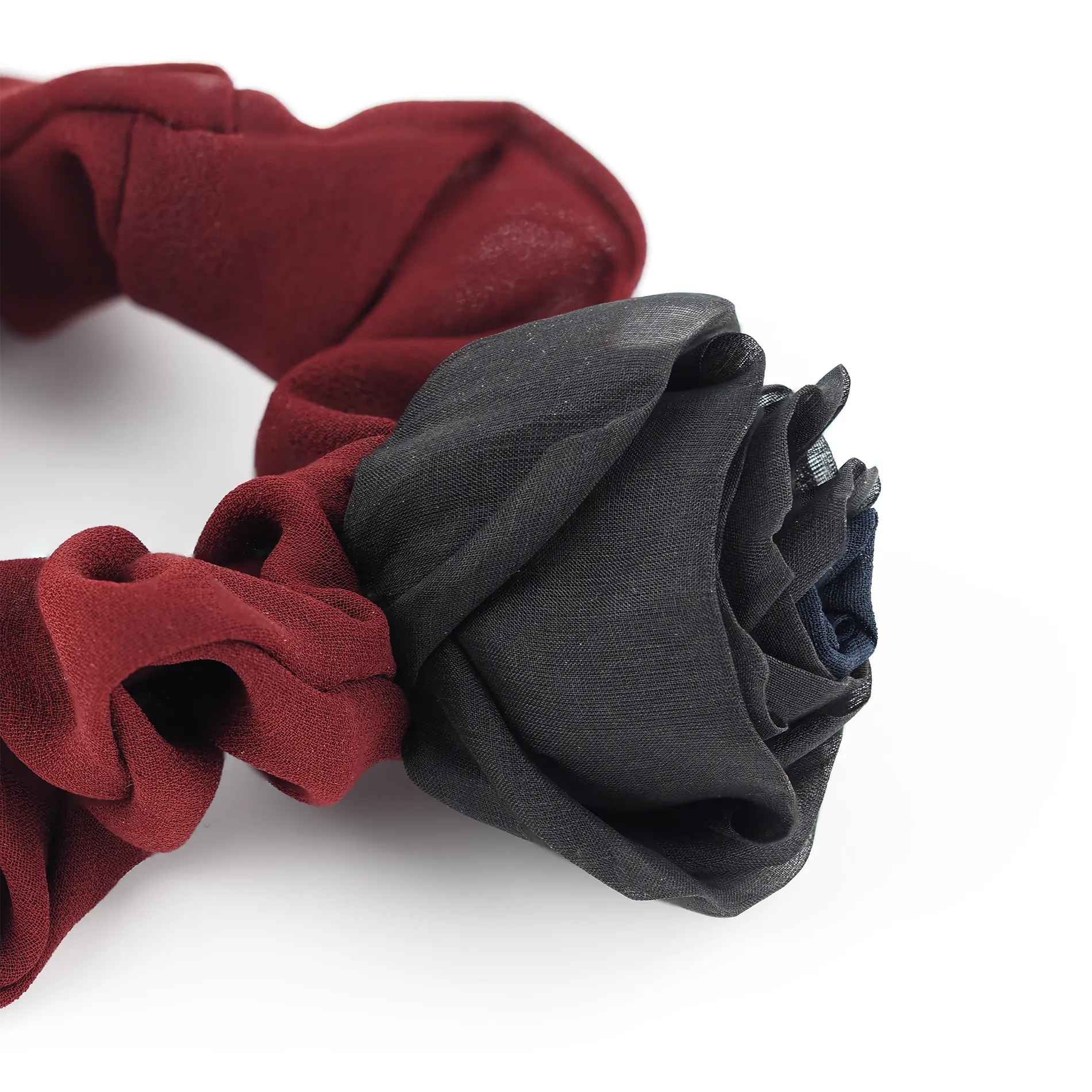 Close-up_view_of_a_handmade_chiffon_scrunchie_with_silk_black_rose