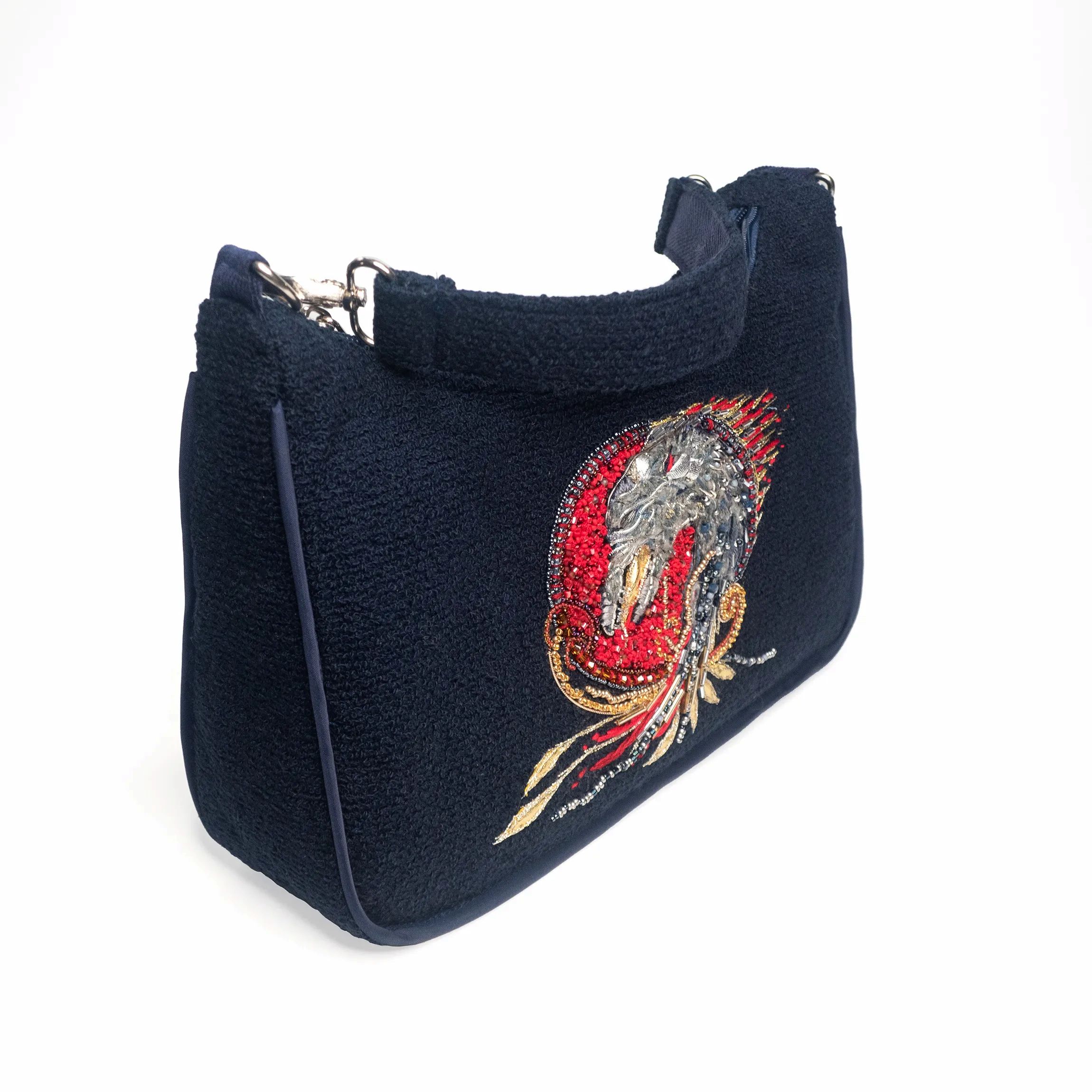 Mini bag with dragon embroidery angled front view