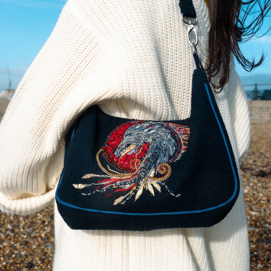 Mini bag with dragon embroidery design worn view