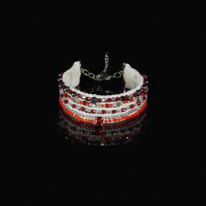 Handmade red and white multi-strand beaded bracelet on textile base with glass beads and central rhinestone detail