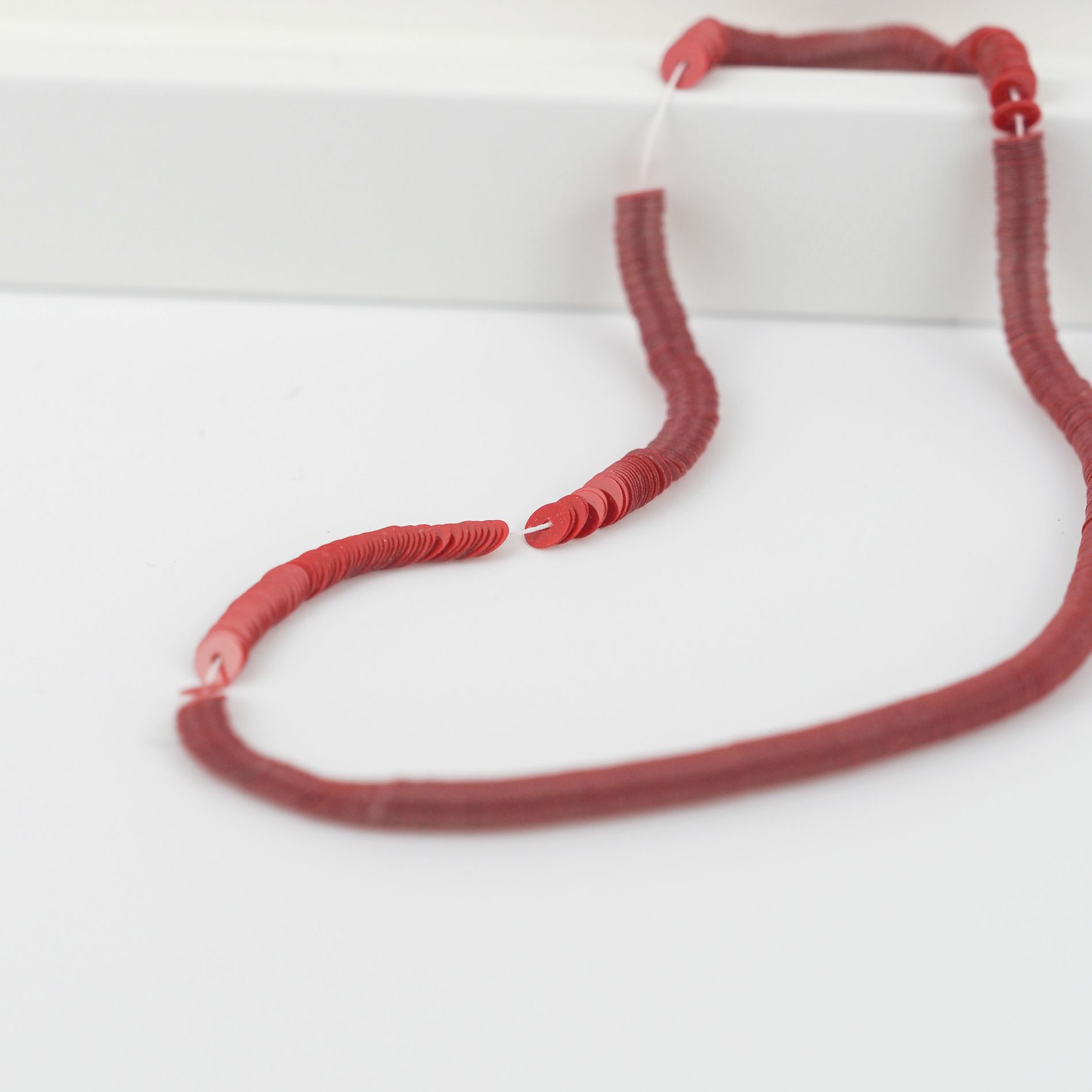 Scarlet-red-flat-sequins-4mm-on-string-Italian-embroidery-sequins.jpg
