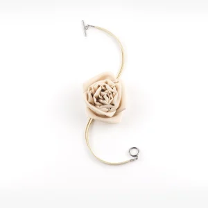 Detailed view of handmade silk chiffon rose choker necklace in beige with suede lace