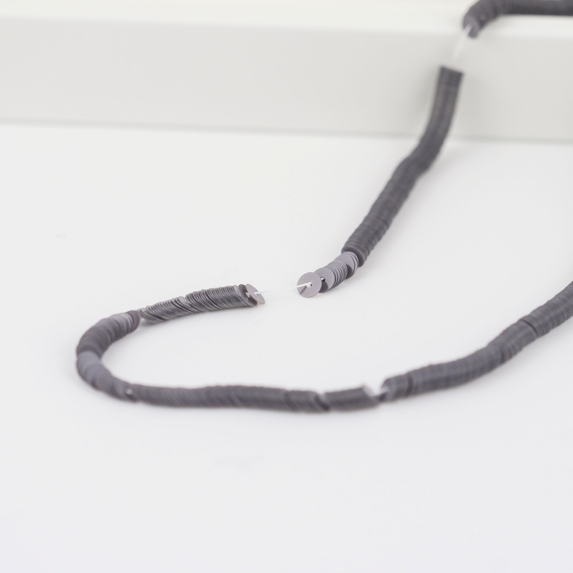 Smoke-grey-flat-sequins-4mm-on-string-Italian-embroidery-sequins.jpg