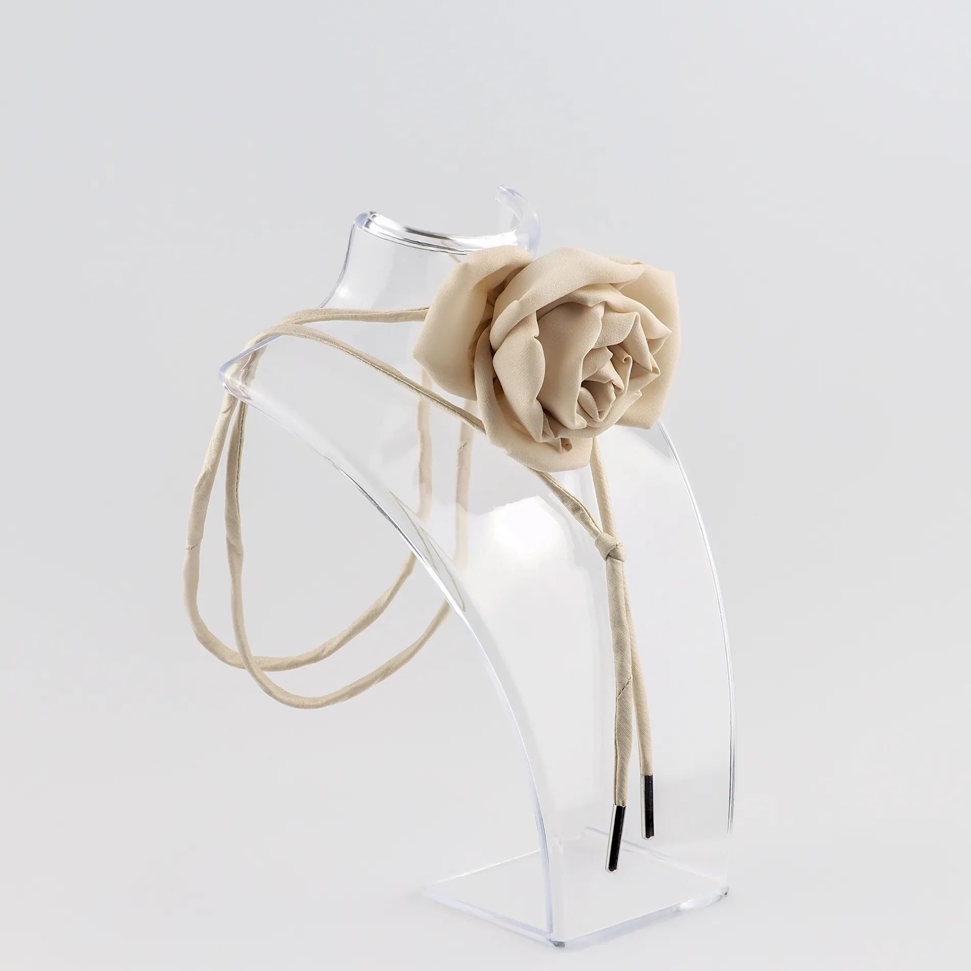 nude-silk-rose-choker-on-clear-acrylic-stand