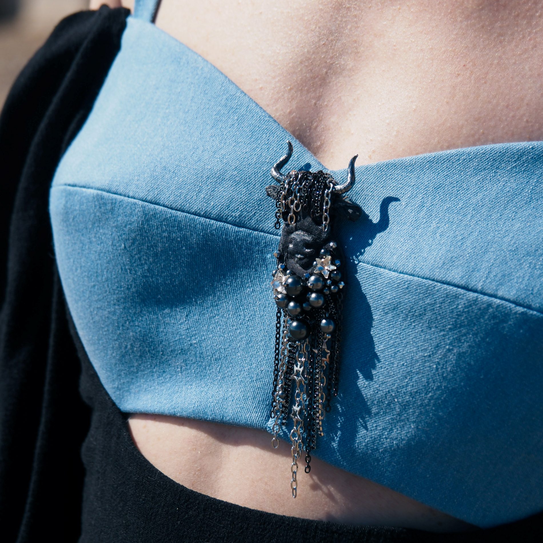 taurus-textile-brooch-styled-on-denim-top
